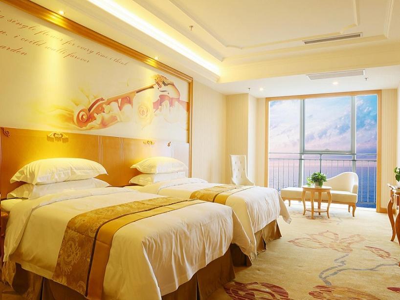 Vienna International Hotel Yantai Changjiang Road Xingyi Square Branch Bagian luar foto