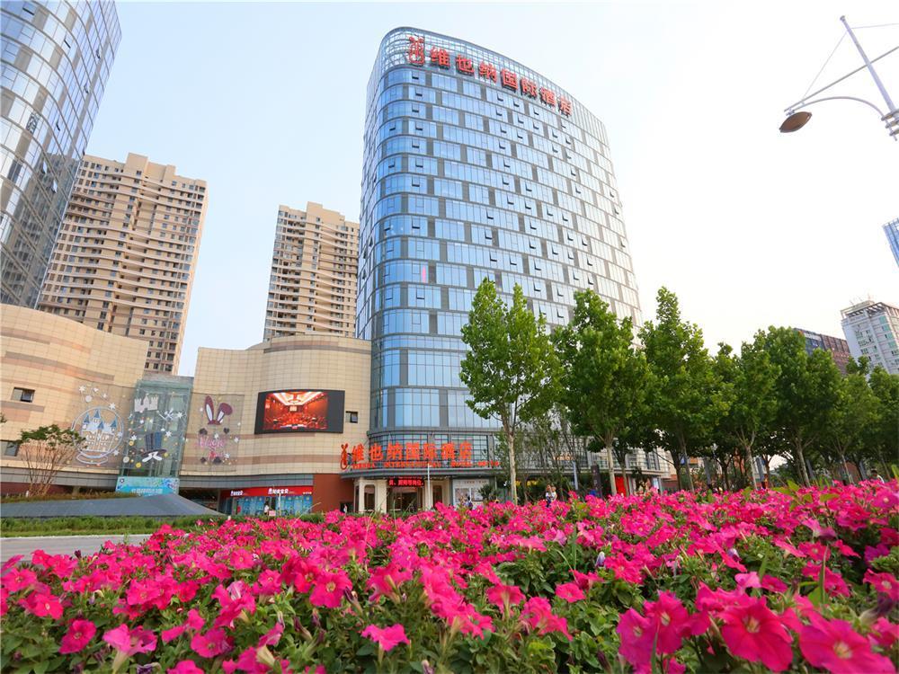 Vienna International Hotel Yantai Changjiang Road Xingyi Square Branch Bagian luar foto